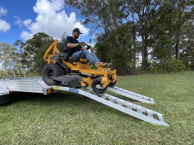 Loading zero turn mower best sale on truck